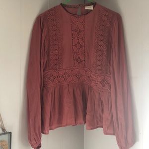 Lacy long sleeve peplum top